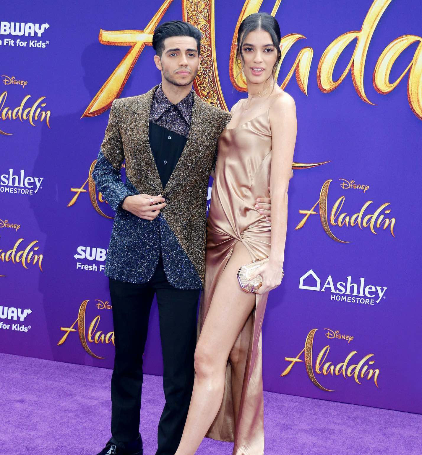 What is Mena Massoud height in feet and cm? We break down his height details clearly.